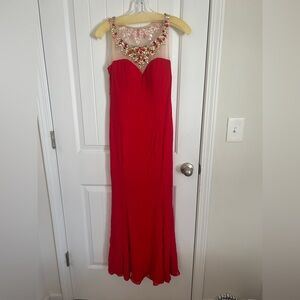 Elegant Red Evening Gown with Embellished Neckline by Tiffany Designs